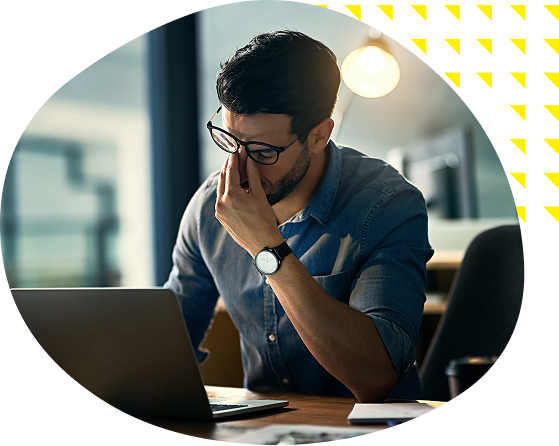 image of a man stressed out while working